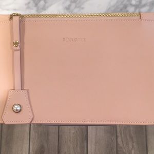 Rena Iman clutch